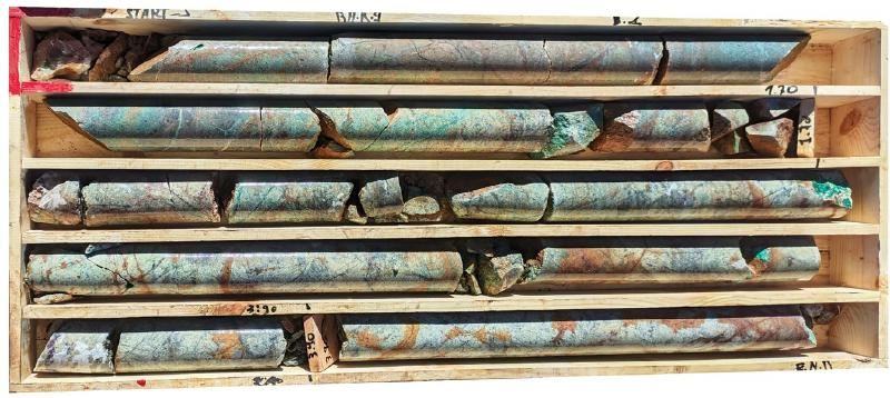 Several pieces of metal in a wooden boxAI-generated content may be incorrect.